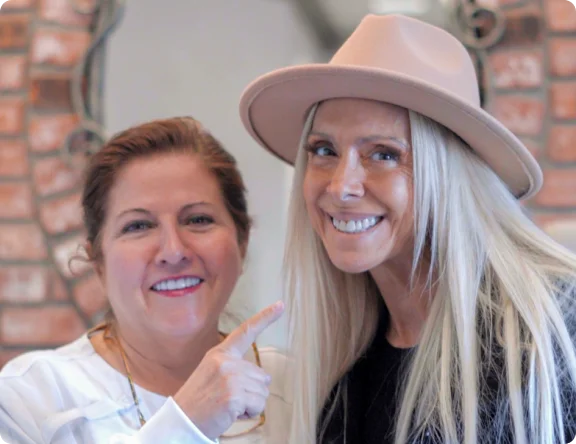 Doctor and female patient smiling for preventive dental care promotion