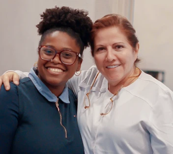 Positive cosmetic dentistry experience shown with doctor and patient in San Diego.