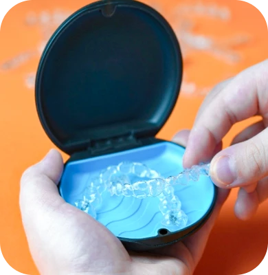 Close-up of Invisalign aligners being worn by a patient at My Smile in San Diego